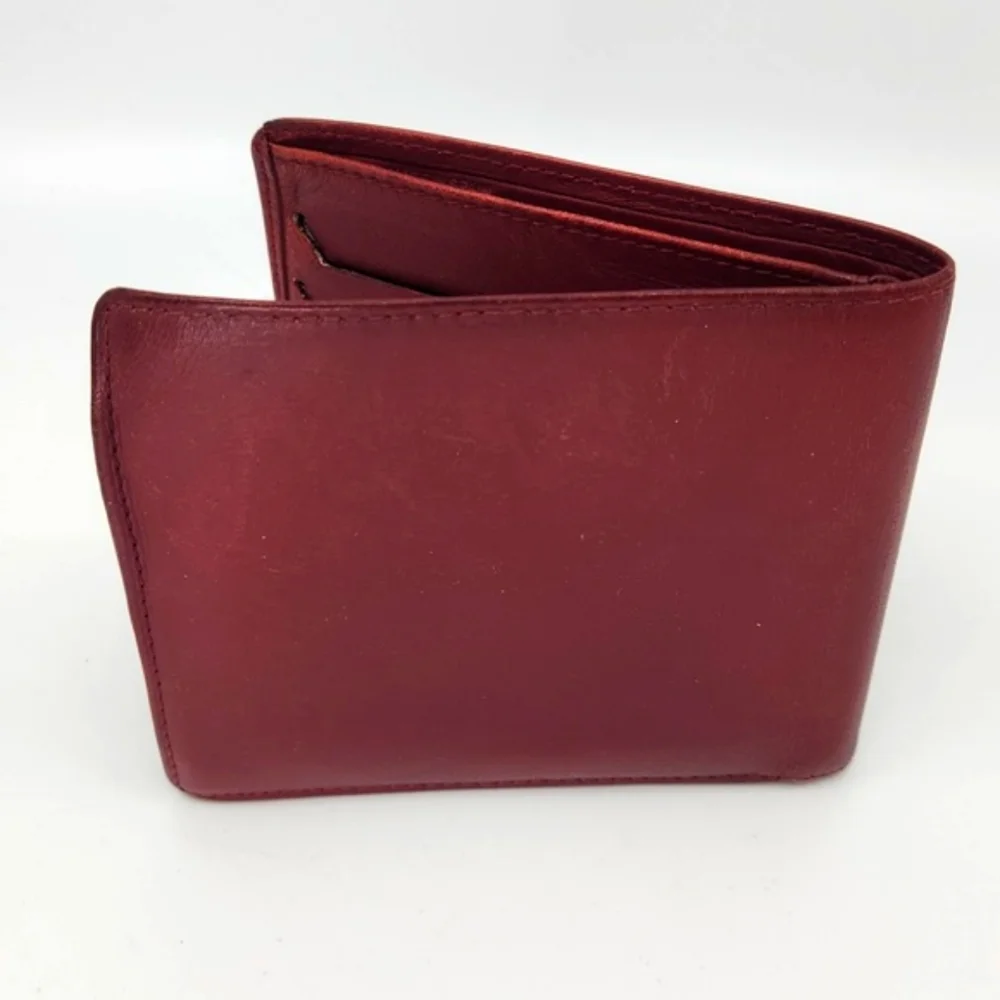 Dior Burgundy Wallet with Gold “CD” Accent. Good condition.